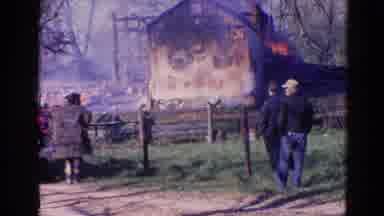 Wauconda Illinois USA (1968): People Standing At Fence Watching As House Burns