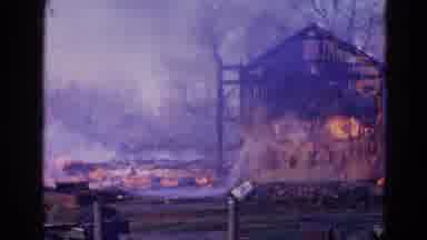 WAUCONDA ILLINOIS USA-1968: Wildfire Burning A Shed Building And Firefighters