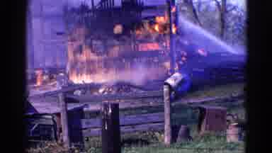 Wauconda Illinois USA (1968): A Burning Building Is Sprayed By Firefighters With A
