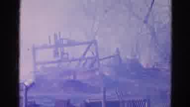Wauconda Illinois USA (1968): The Smoldering Ruins Of A Burnt Building Crumble And