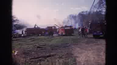 Wauconda Illinois USA (1968): Several Trucks And Firefighters With Steam And Smoke