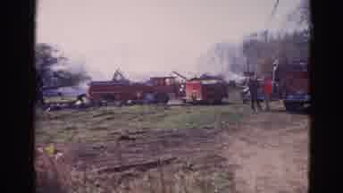 Wauconda Illinois USA (1968): Fire Trucks Firemen Accident Scene Smoke Rising