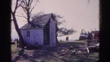 Wauconda Illinois USA (1968): 3 People Walking A Guy Holding The Latter By A Red