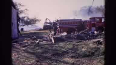 Wauconda Illinois USA (1968): Firefighters With Their Big Red Truck Finishing Up A