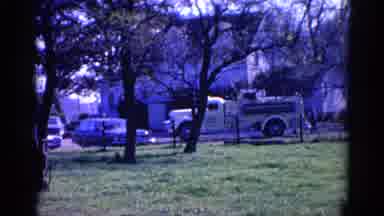Wauconda Illinois USA (1968): Gloomy Day In Park Trees Blowing Fire Truck And Car