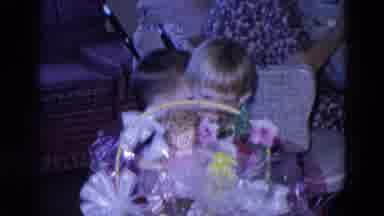 Chicago Illinois USA (1969): Two Kids Are Walking In The Room And The Boy Receives