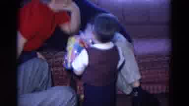 Chicago Illinois USA (1969): Boy's Getting Birthday Presents At His Party And He