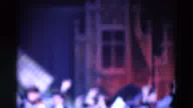 Chicago Illinois USA (1969): Woman Wearing Blue Dress Spins For Audience Sitting