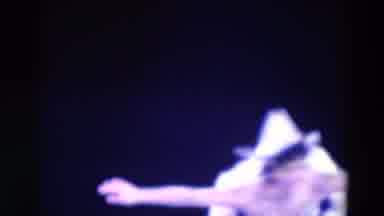Chicago Illinois USA (1969): Costumed Ice Skater Twirls In Place Under Spotlight