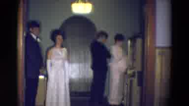 Diller Nebraska (1969): Men And Women In Fancy Dress Talk As One Woman Picks