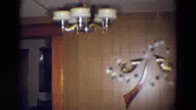 Diller Nebraska (1969): Camera Captures The Wall Decor And The Ceiling Light In