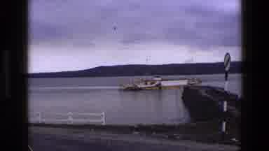 England (1969): A Big Boat Moving Slow With Dark Clouds
