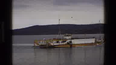 England (1969): Small Yellow Ferry Crosses Wide Area Of Water With No Passengers