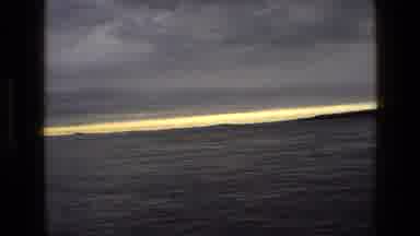 England (1969): Sunset On Large Open And Still Waters Almost At Night Time