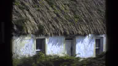 England (1969): Whitewashed Quaint Cottage With A Thatched Roof That Has Seen