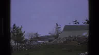 England (1969): Shaky Camera Films Roofs Of Two Suburban Houses