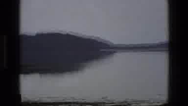 England (1969): A View Of A Lake Surrounded By Swamp