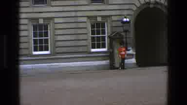 England (1969): A Military Guard In Dress Uniform And Armed With A Rifle Stands