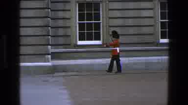 England (1969): Old Footage Of A Queen's Guard Or Cavalry Soldier Marching On
