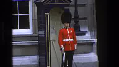 England (1969): Royal Guard Stands As Tourists Gather And Cops Keep The Peace