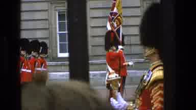 England (1969): A View Of The Changing Of The Guard Wearing Red Uniforms On A
