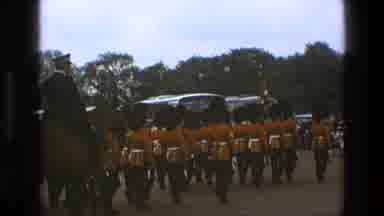 England (1969): British Soldiers March In Dress Uniform Within A Parade Through A