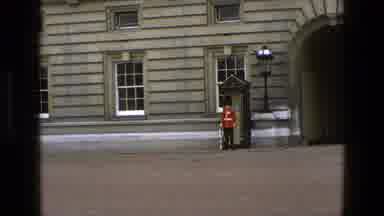 England (1969): A View Of A Soldier Standing Outside Of A Building