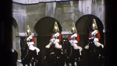 England (1969): Riders Sitting On The Black Horses Wearing Soldier Like Dress In A