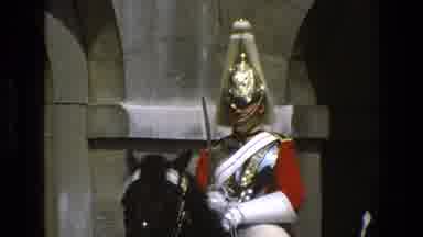 England (1969): A Soldier Dressed In Uniform Sitting On Top Of A Black Horse