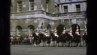 England (1969): Guards Sits On Horseback In A Line Together As The Crowd Gathers