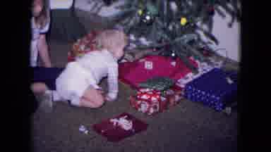 Fort Wayne Indiana (1969): A Little Baby Playing With Toys By Christmas Tree