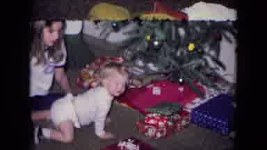 Fort Wayne Indiana (1969): Young Girl And Baby Examine The Presents Under The