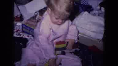 Fort Wayne Indiana (1969): Baby Is Playing With His Toys
