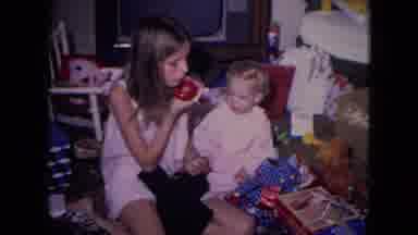 Fort Wayne Indiana (1969): Girl Plays With Baby Amid Toys Inside Her Home