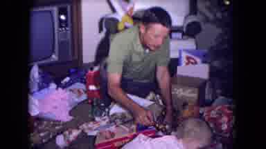 Fort Wayne Indiana (1969): Father Tries To Amuse Son That Still Stood Still