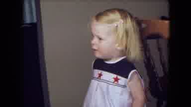 Fort Wayne Indiana (1969): A Small White Child Wearing A Dress With Stars On It