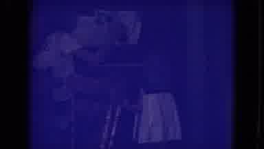 Fort Wayne Indiana (1969): A Person Sits At A Piano While A Small Child Watches