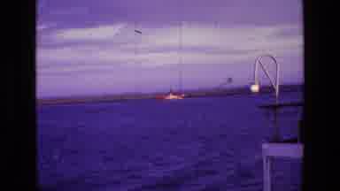 Ireland (1969): Two Ships In The Sea Guided By Failing Sun Light And Lanterns