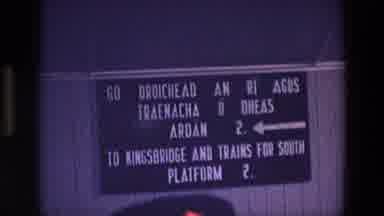 Ireland (1969): Sign On Wall In Train Station Kingsbridge People Walking By