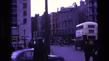 Ireland (1969): Large City Street With Double Decker Bus Driving As People Cross