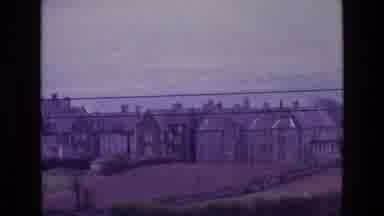 Ireland (1969): Buildings Are Seen Next To A Pasture With Grazing Animals