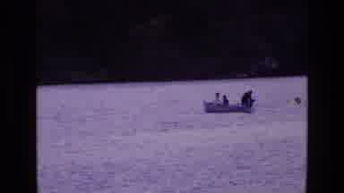 Ireland (1969): Three People Out On The Lake In A Boat And One Is Trying To Fix