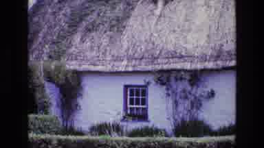 Ireland (1969): Old Building With A Straw Roof Zooming In On Its Sole Window