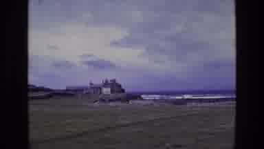 Ireland (1969): Zooming In On A House Set Next To The Beach And The Ocean