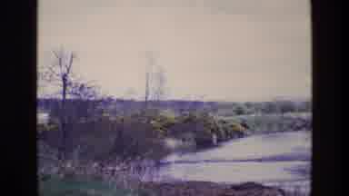 Ireland (1969): Leaves Changing To Fall Colors Along A Wide Flowing Body Of Water