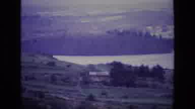 Ireland (1969): Footage Overlooking Rural Building And Pastures Next To Lake (Or
