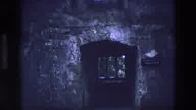 Ireland (1969): Tall Dark Abandoned Stone Building With Windows Surrounded By