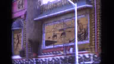 Lake Canyon Arizona (1969): An Old Looking Building Windows Covered In Paintings