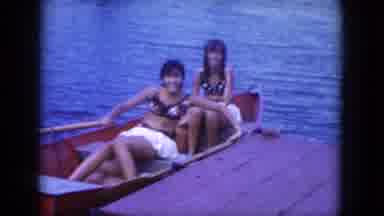 Lake Canyon Arizona (1969): Girl In Front Of Canoe Paddles Backward Away From Deck