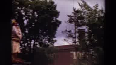 Minnesota USA (1969): Parade With A Clown On A Bicycle And A Statue Of An Indian